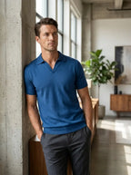 Male model wearing the merino wool polo shirt - lifestyle