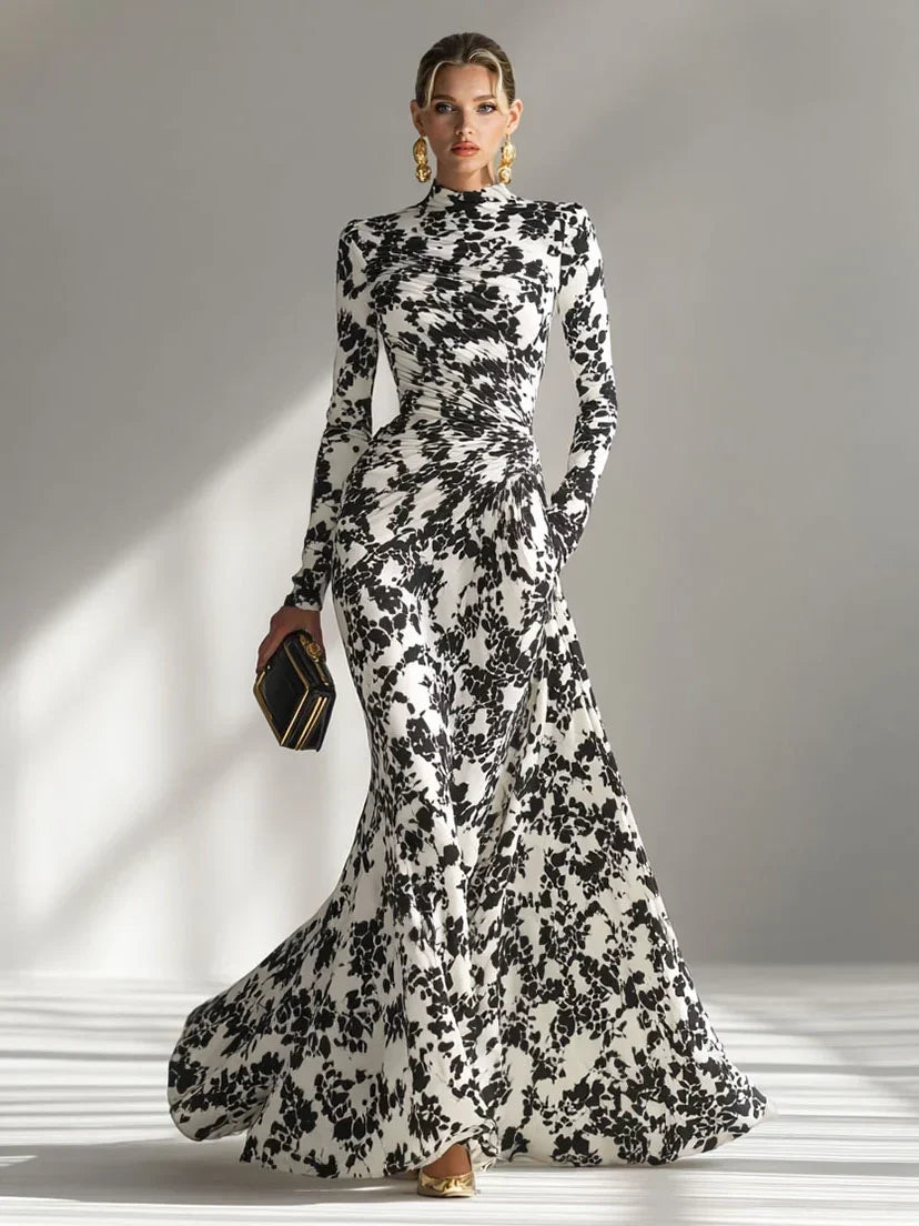 Model wearing the abstract floral mermaid maxi dress in Red