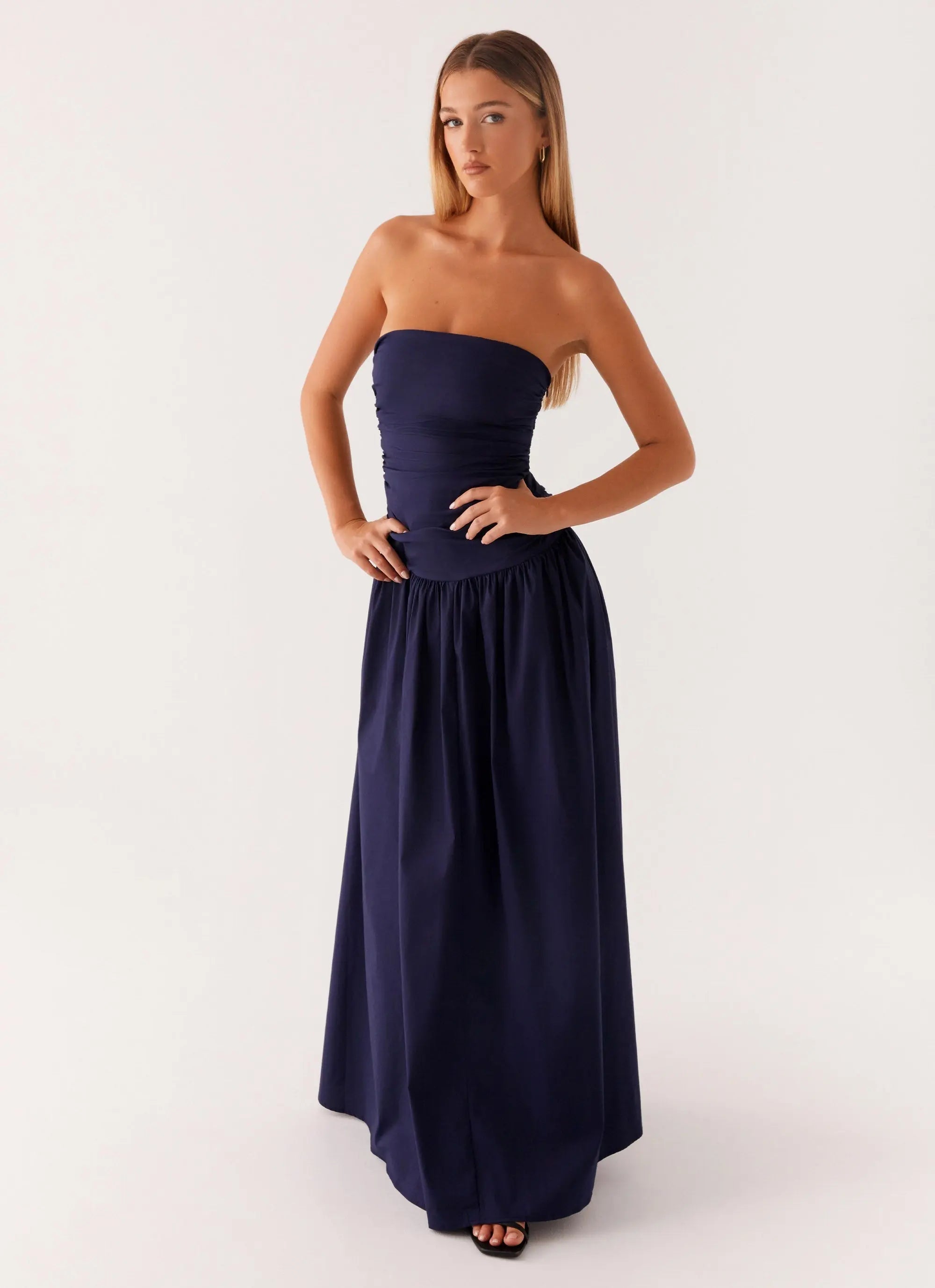 Strapless maxi dress with flared hem in navy
