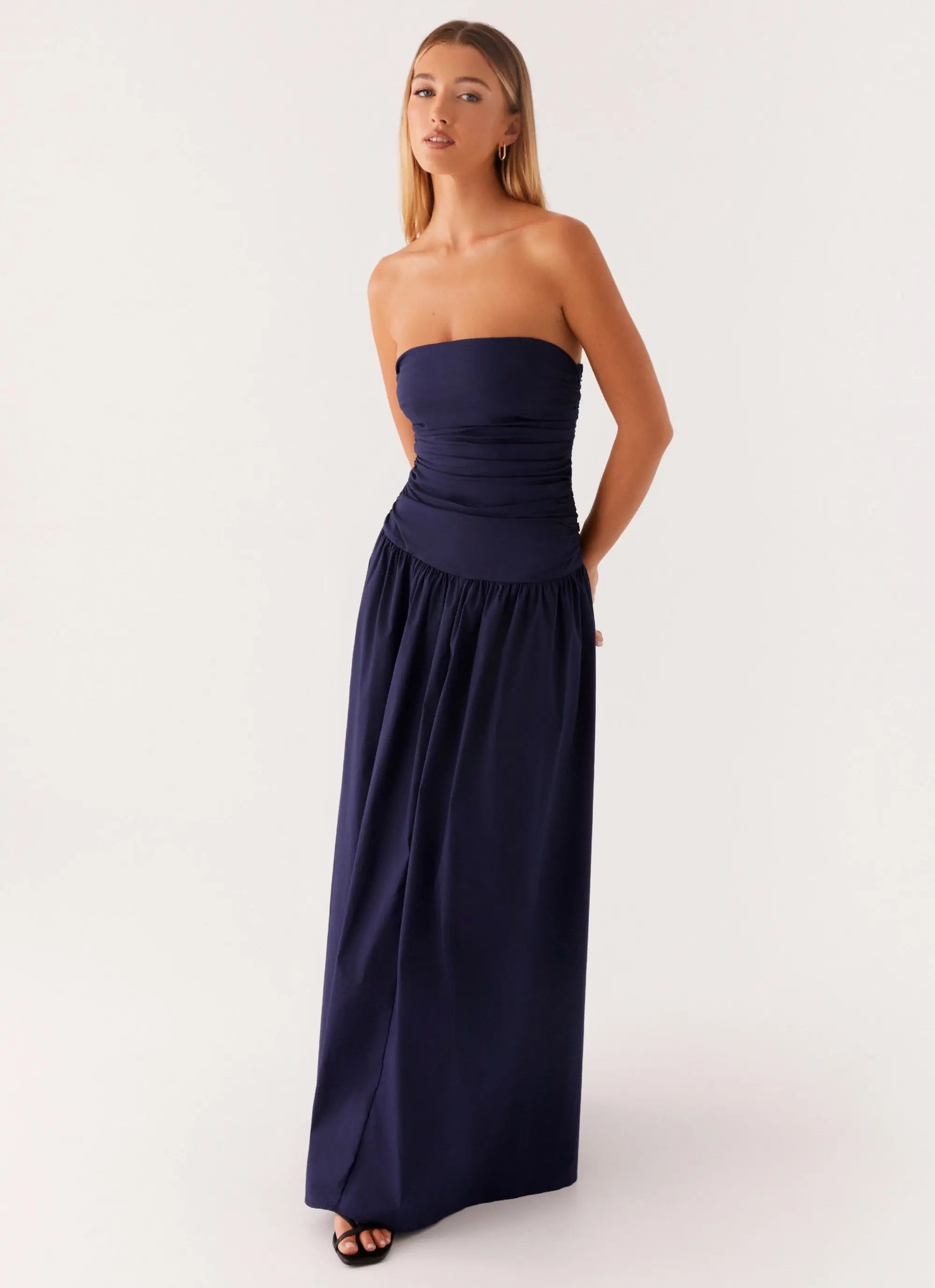 Strapless maxi dress with flared hem in navy